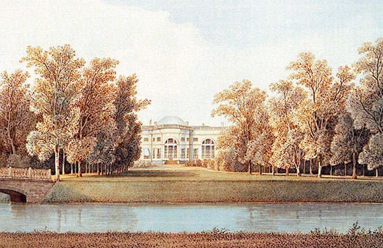 The Alexander Palace partially obscured by trees, with the lake in front