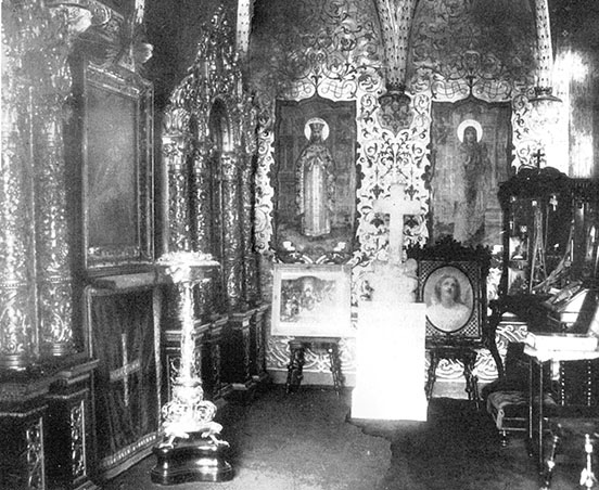 Interior of the Oratory in the Alexander Palace, showing all the gilt decoration around the icons and portraits