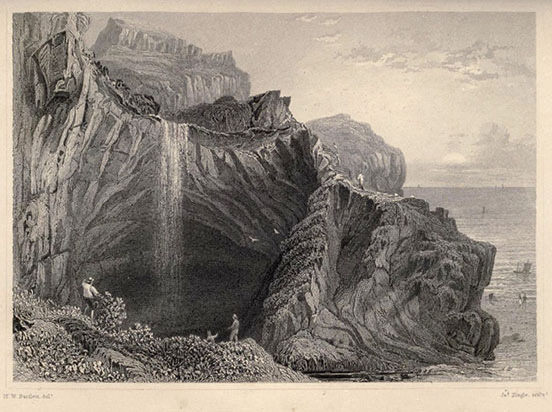 cliffs with a waterfall to the rear left and centre; ocean to the right; man on the hill front left, looking across a blowhole at the waterfall