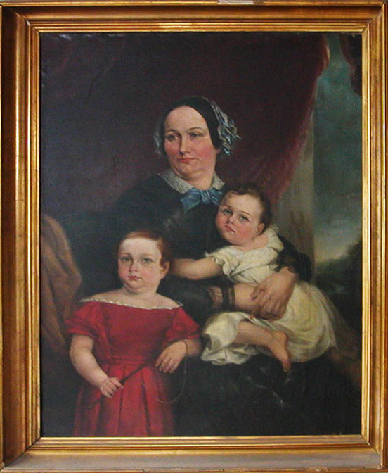 Lydia Eastwick with two young sons, William on the left in a red dress and George in her arms in a white baby gown