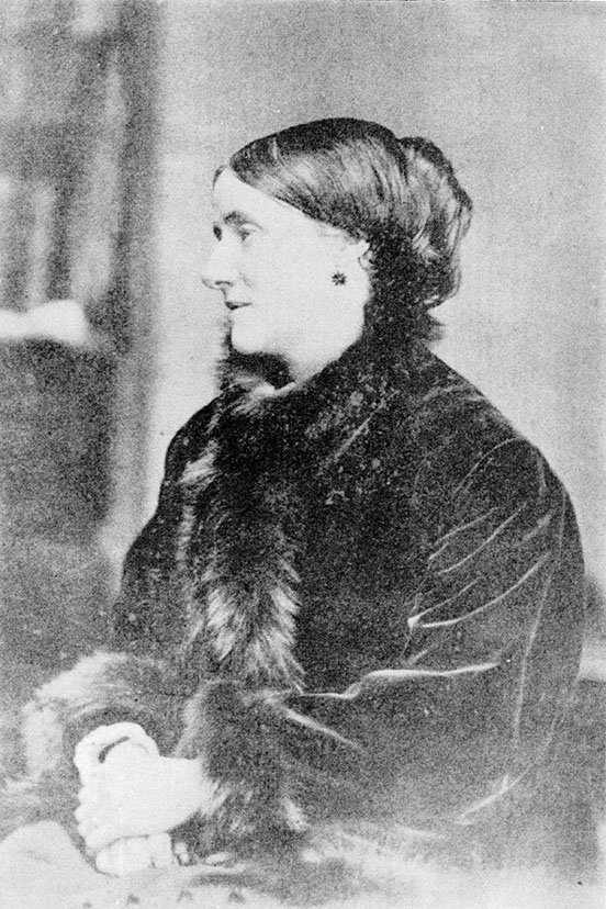 Deborah Delano Whistler, wearing fur and velvet, facing left with an earring visible